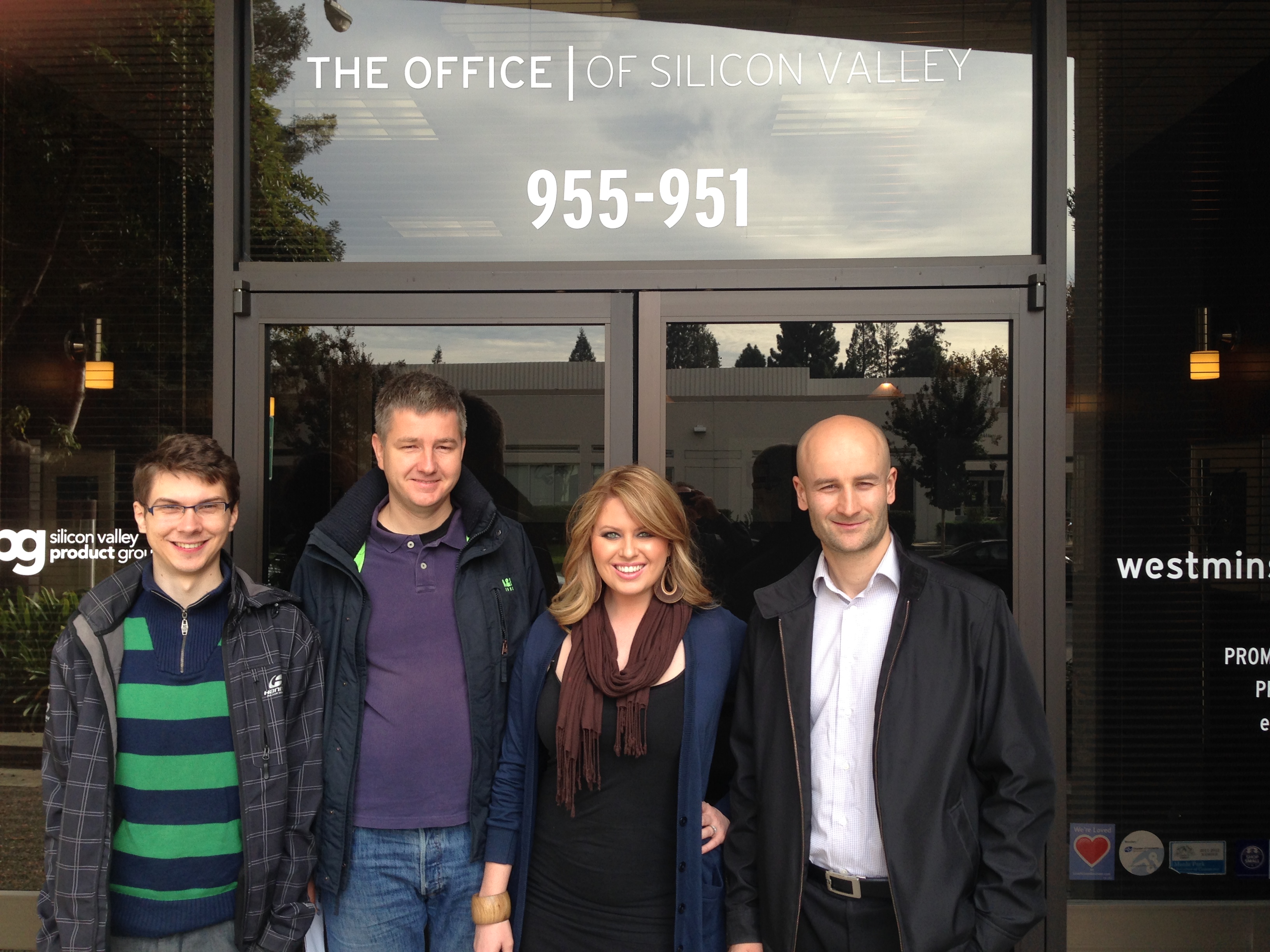 Petr, Gábor, Jamie and Rasta in front of the office