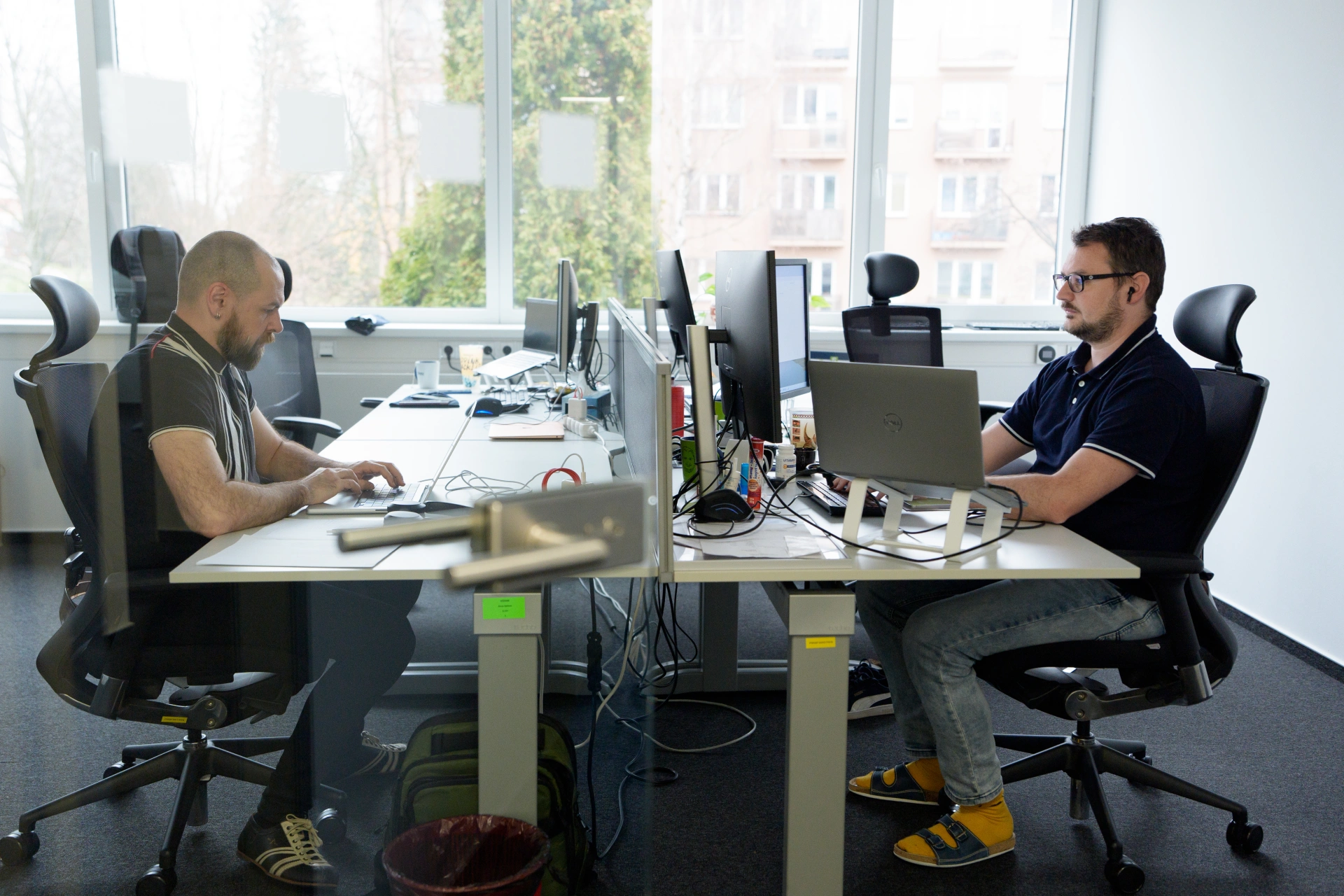 profiq teammates collaborating at a table